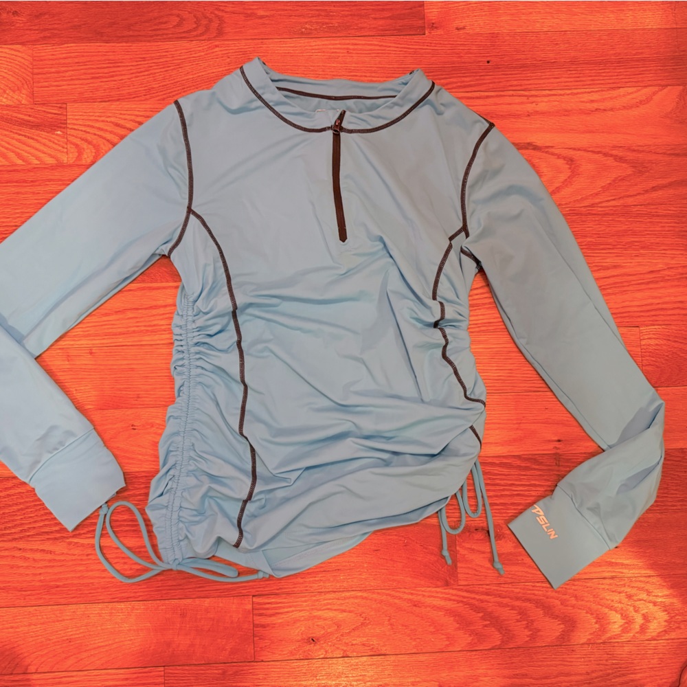 Turquoise swim rash guard